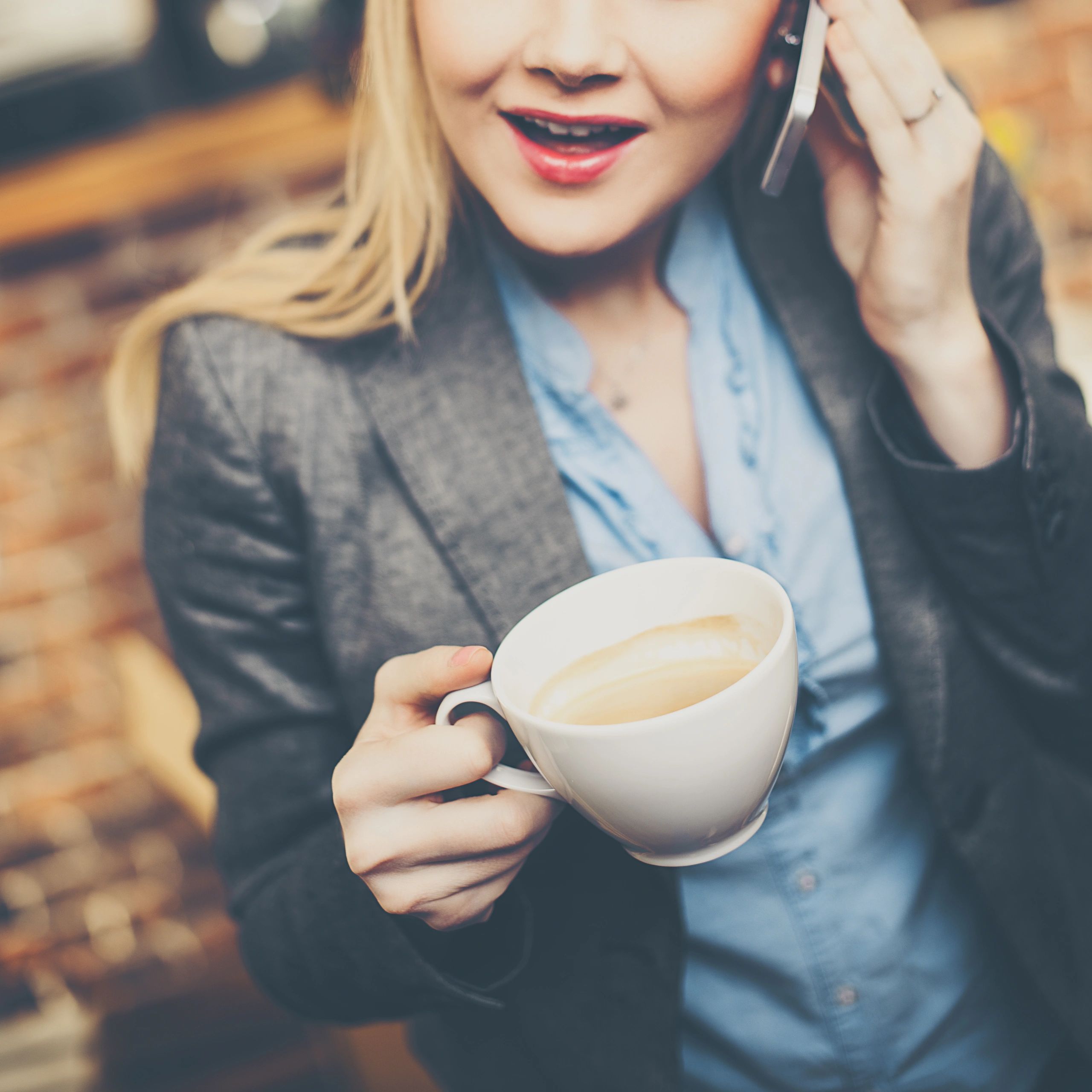 Happy customer drinking coffee